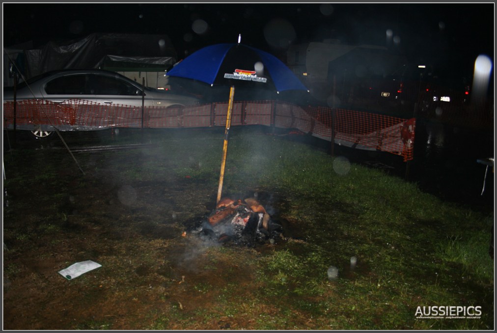 V8 Supercar shots from Bathurst 2011 : Umbrella over campfire