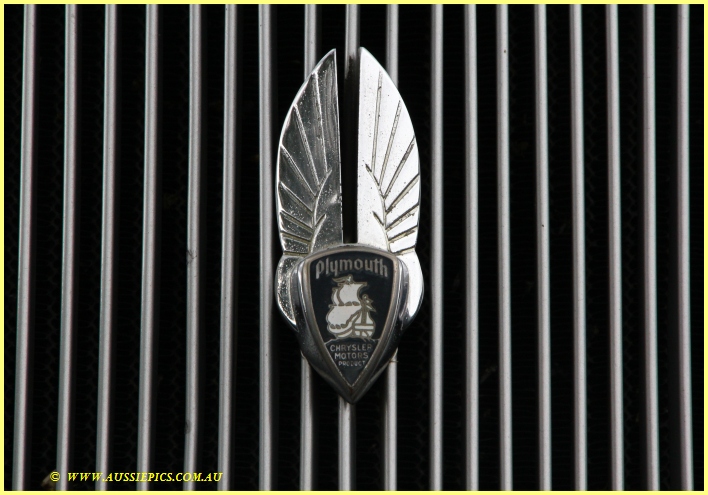Grill badge of a Plymouth Clipper, by Chrysler