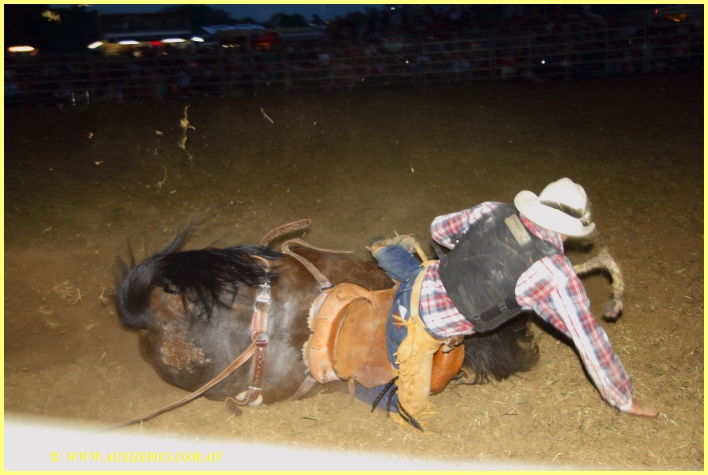 Rodeo horse lost his balance, and his rider