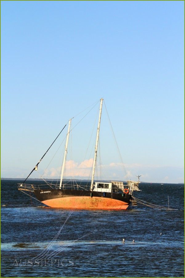 The 'Lady Hendrina' sitting in the mud at low tide.